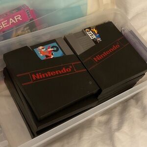Nintendo Red and Black Game Cartridges box of ten
